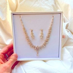 Beautiful gold bridal necklace and earrings set. Never worn.